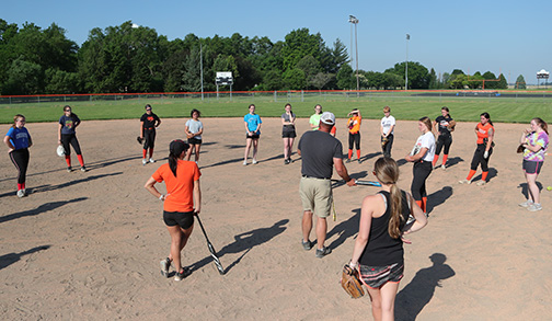 Socially distant softball practice